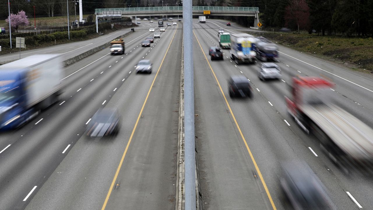 Cars and trucks travel on Interstate 5 near Olympia, Wash. (AP Photo/Ted S. Warren, File)