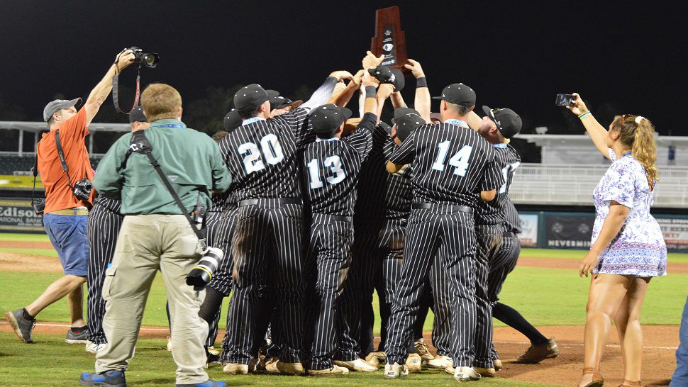 Raiders players celebrating the school's first state championship