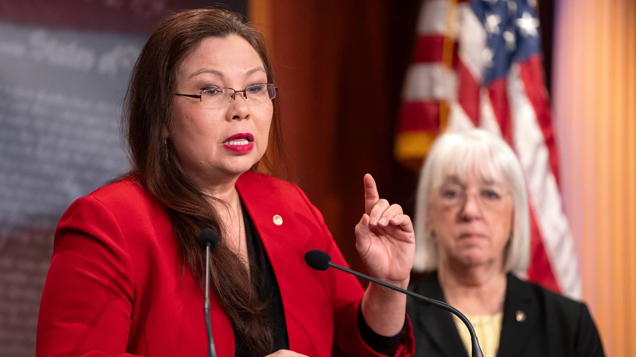 Sen. Tammy Duckworth, D-Ill., speaks about a bill to establish federal protections for IVF as Sen. Patty Murray, D-Wash., right, listens during a press event on Capitol Hill, Tuesday, Feb. 27, 2024, in Washington. (AP Photo/Mark Schiefelbein, File)