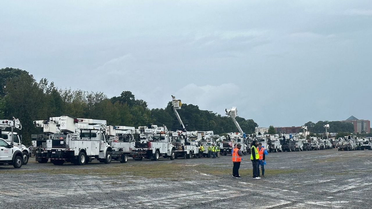 Duke Energy crews are staged at Charlotte Motor Speedway before being sent out to areas across the state impacted by Helene. (Spectrum News 1/Molly Hurley)