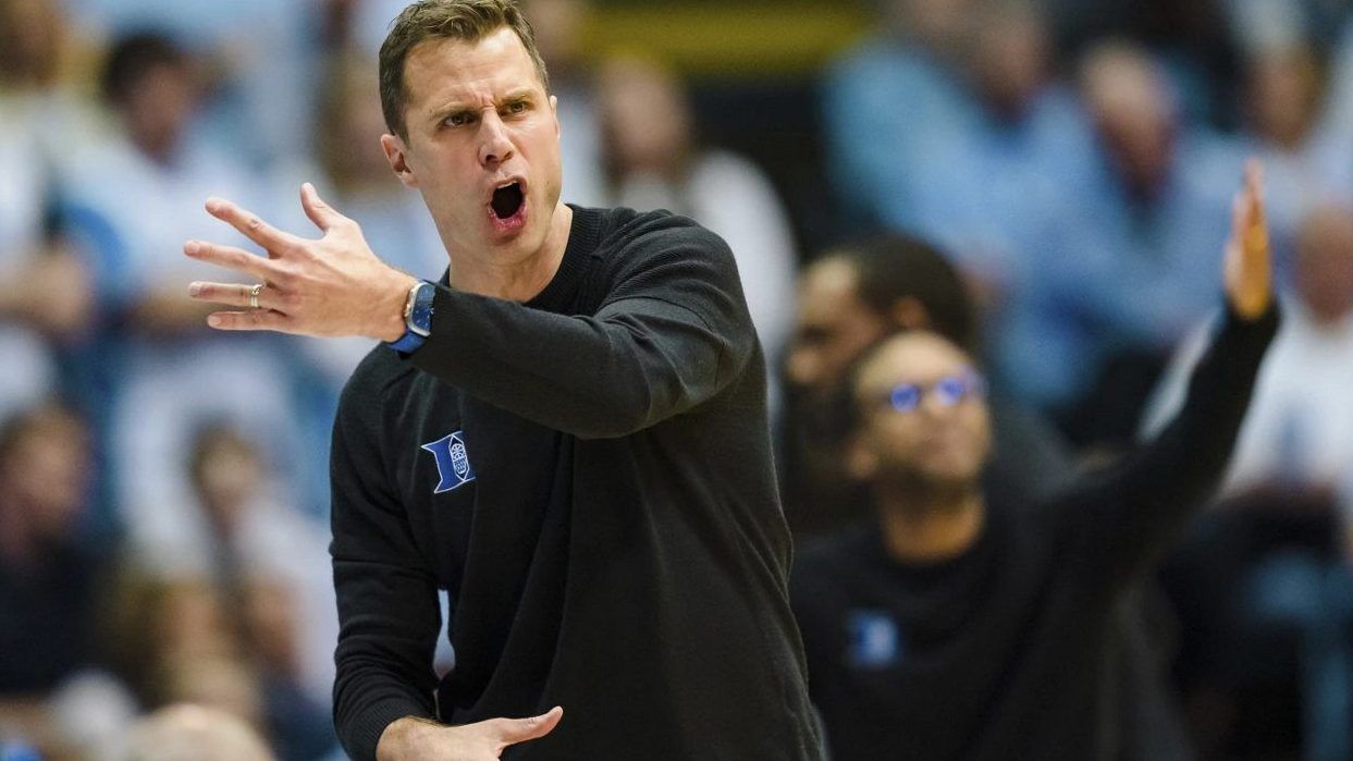 Duke head coach Jon Scheyer looks on during an NCAA college basketball game against North Carolina on Saturday, March 4, 2023, in Chapel Hill, N.C. Kansas is the preseason No. 1 in the AP men's college basketball poll, released Monday, Oct. 16, 2023. Duke picked up 11 first-place votes to land at No. 2 in Jon Scheyer's second season. (AP Photo/Jacob Kupferman, File)