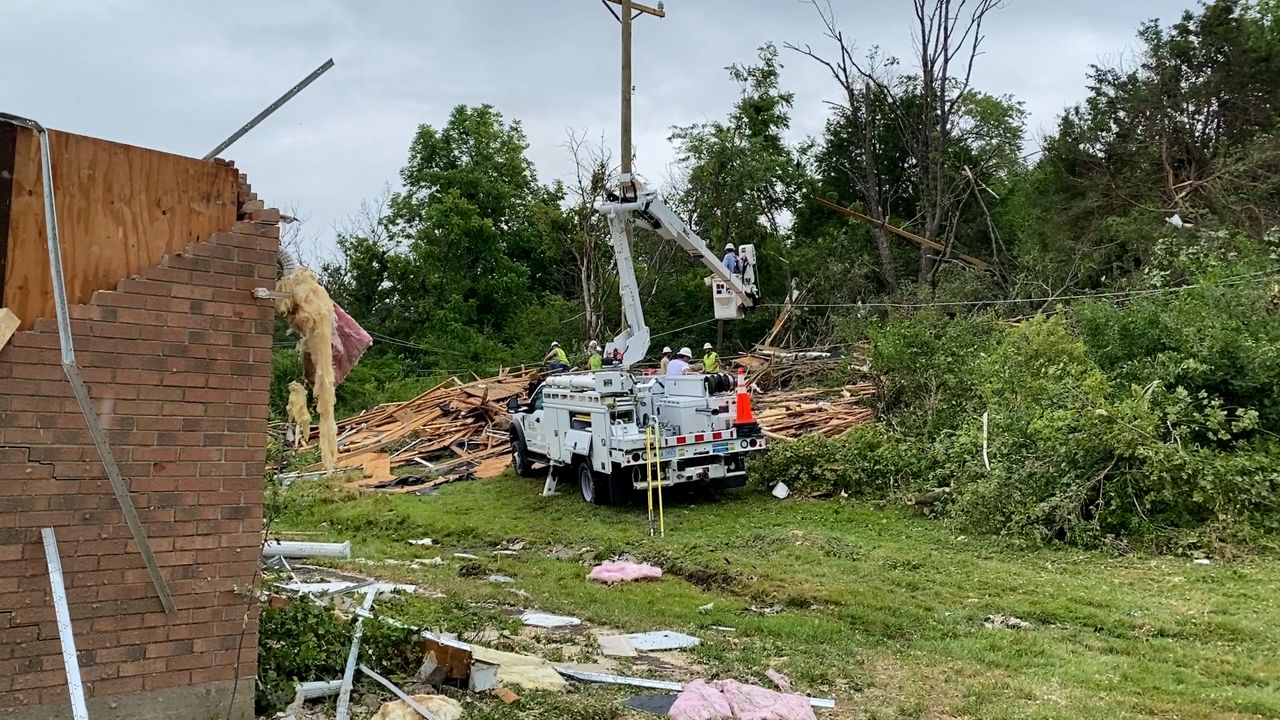 Duke Energy crews working to restore power in Goshen Township (Photo: Tino Bovenzi, Spectrum News 1).