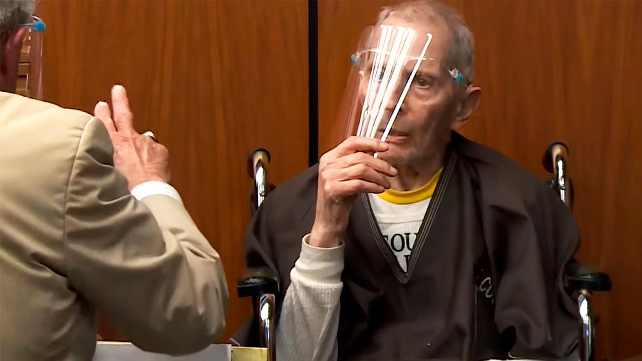 In this still image taken from the Law & Crime Network court video, real estate heir Robert Durst asks if he can remove his face mask during his murder trial on Aug. 9, 2021, in LA County Superior Court in Inglewood, Calif. (Law & Crime Network via AP, Pool)