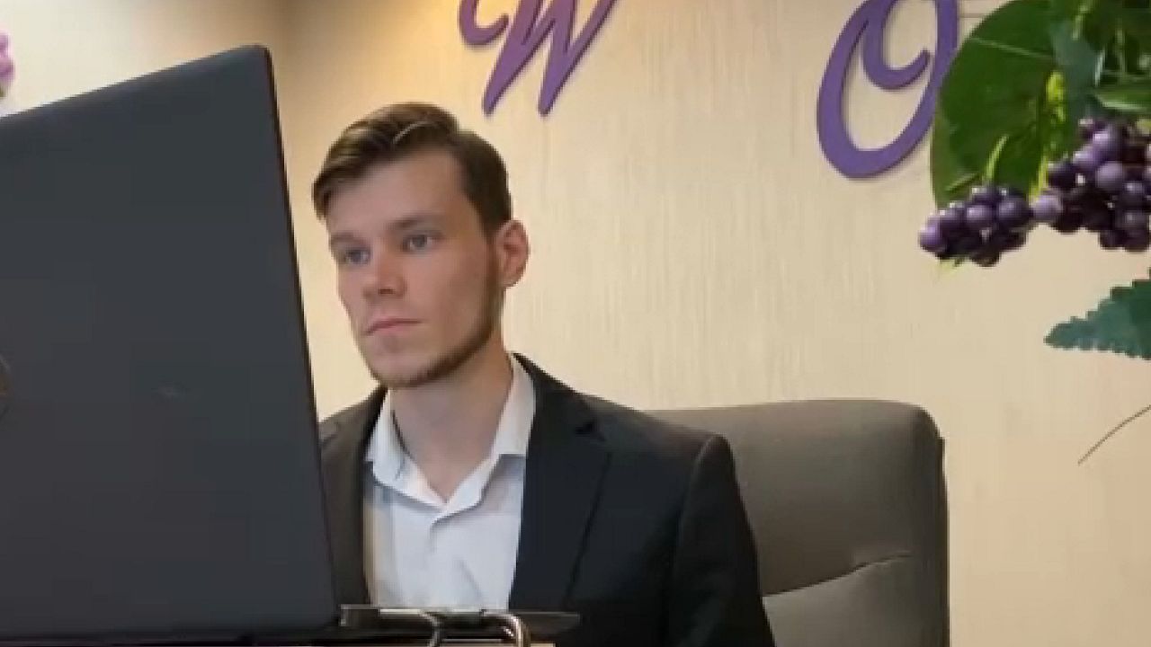 Man seated at computer