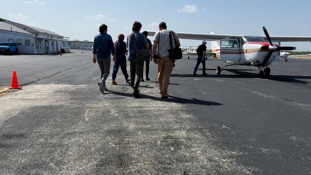 Environmental experts and members of the media were provided a bird’s-eye view of methane flaring across the San Antonio region. (Spectrum News 1/Dylan Scott)