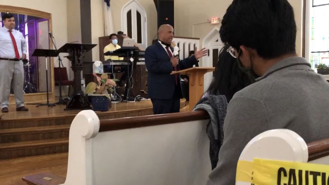 Sheriff Juan Figueroa connects with the immigrant community because he is Hispanic, speaks Spanish, and has publicly supported pro-immigrant laws.