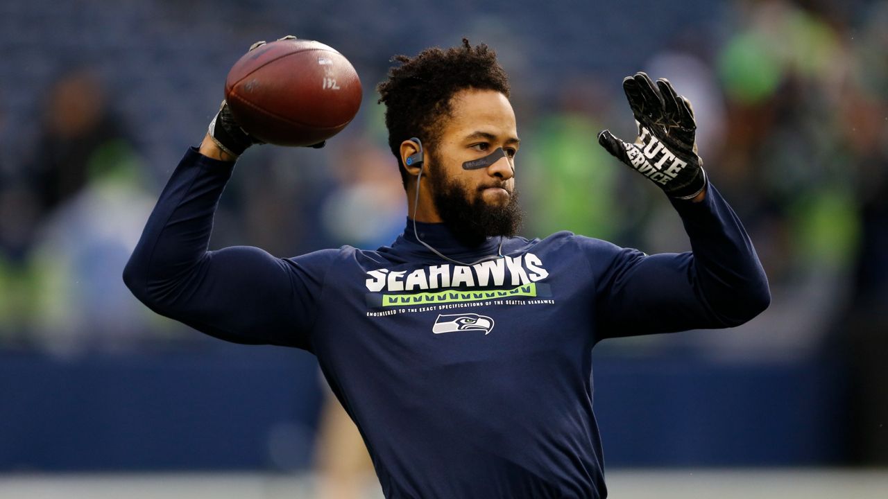 Earl Thomas warms up before an NFL football game against the Atlanta Falcons, Monday, Nov. 20, 2017, in Seattle. (AP Photo/Stephen Brashear)