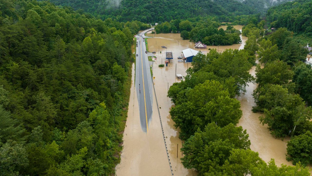 Buildings and roads are flooded near Lost Creek, Ky., Thursday, July 28, 2022. Heavy rains have caused flash flooding and mudslides as storms pound parts of central Appalachia. (Ryan C. Hermens/Lexington Herald-Leader via AP)