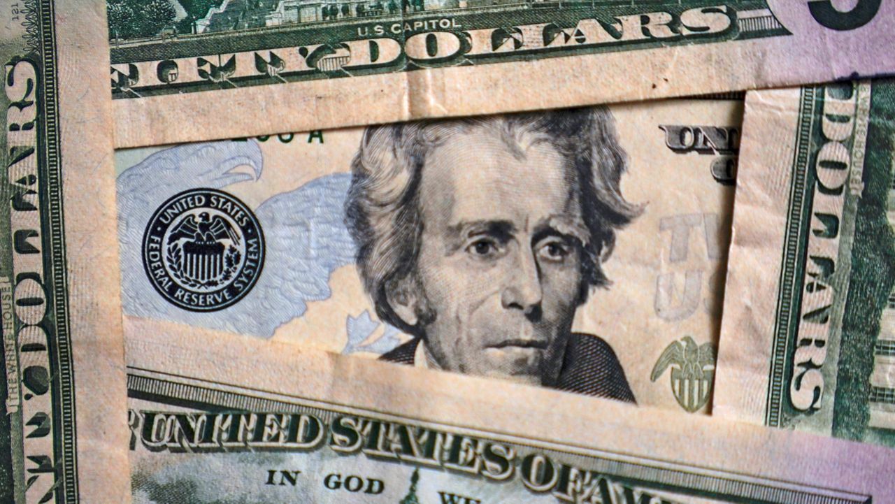 Photo of Andrew Jackson on a $20 bill is shown, Jan. 28, 2022, in Cleveland. (AP Photo/Tony Dejak)