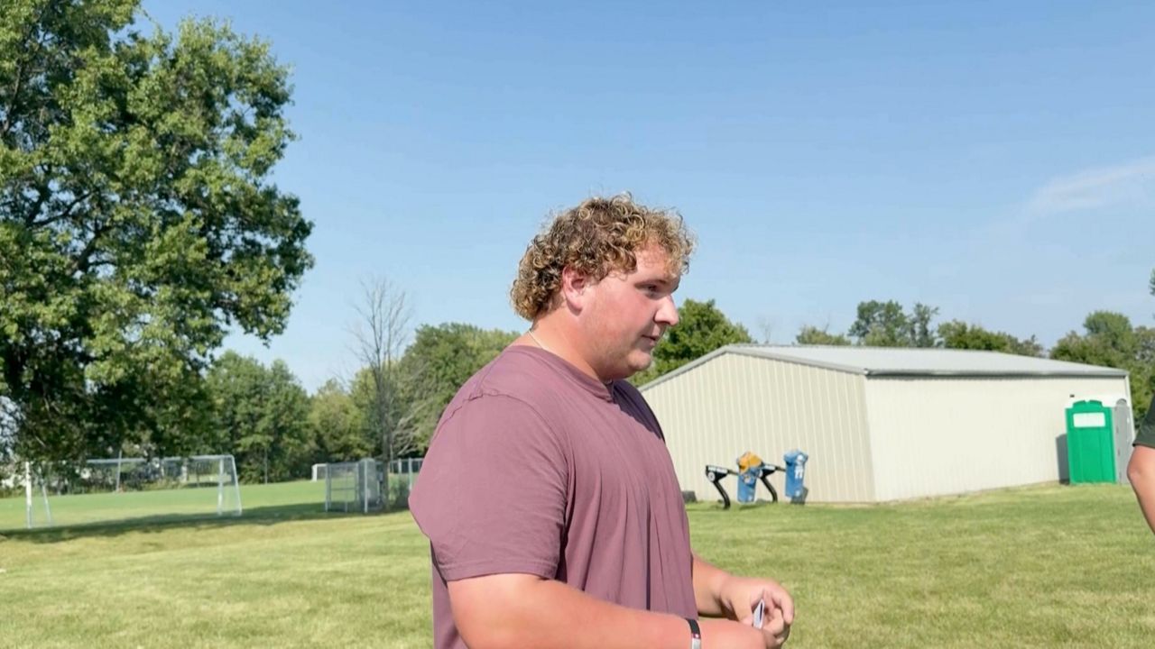 High school football player sidelined by blood clots finds new role on the sidelines