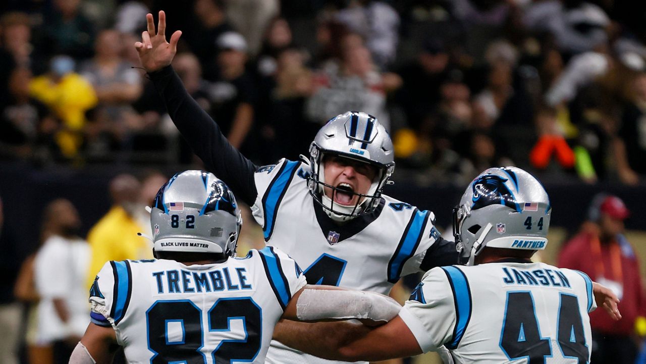 Carolina Panthers place kicker Eddy Pineiro (4) celebrates after kicking the winning field goal during the second half an NFL football game between the Carolina Panthers and the New Orleans Saints in New Orleans on Sunday, Jan. 8, 2023. (AP Photo/Butch Dill)