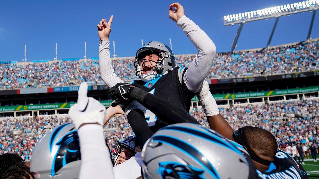 Carolina Panthers' Eddy Pineiro (4) celebrates after kicking the game-winning field goal of an NFL football game against the Houston Texans on Sunday, Oct. 29, 2023, in Charlotte, N.C. The Panthers won 15-13. (AP Photo/Erik Verduzco)