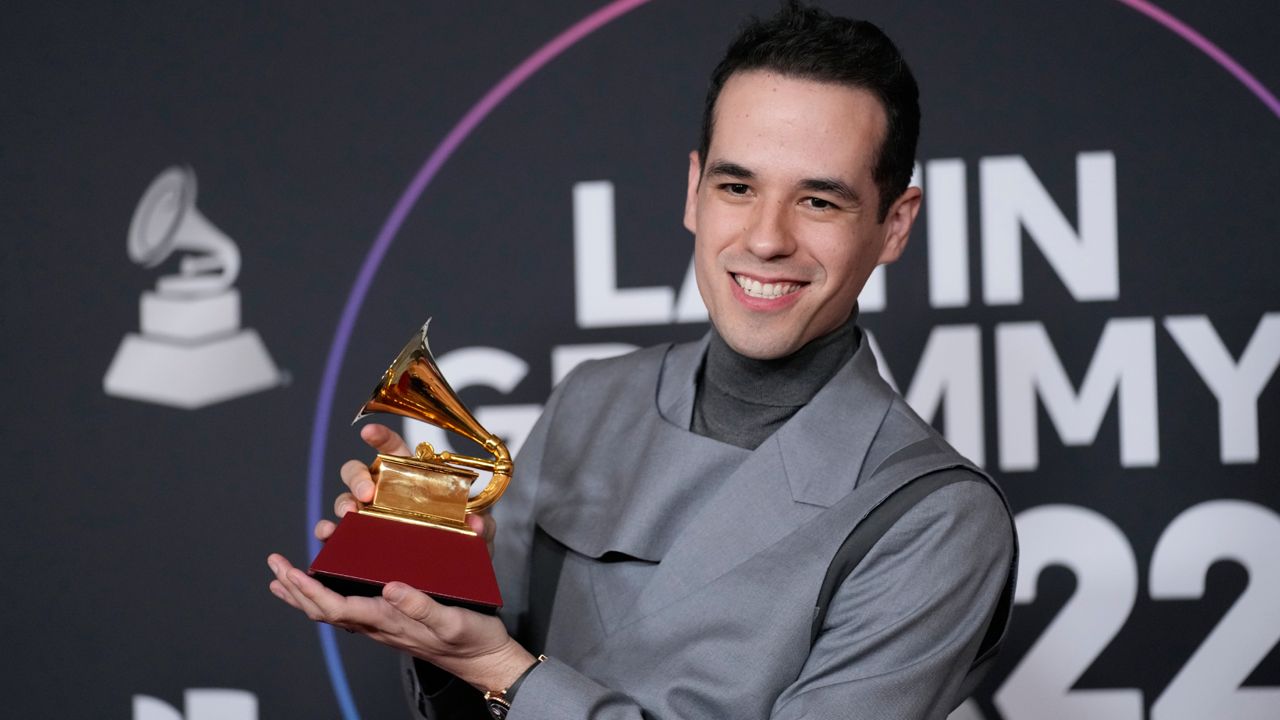 Edgar Barrera poses with a Grammy at the 23rd annual Latin Grammy Awards on Nov. 17, 2022, in Las Vegas. (AP Photo/John Locher)