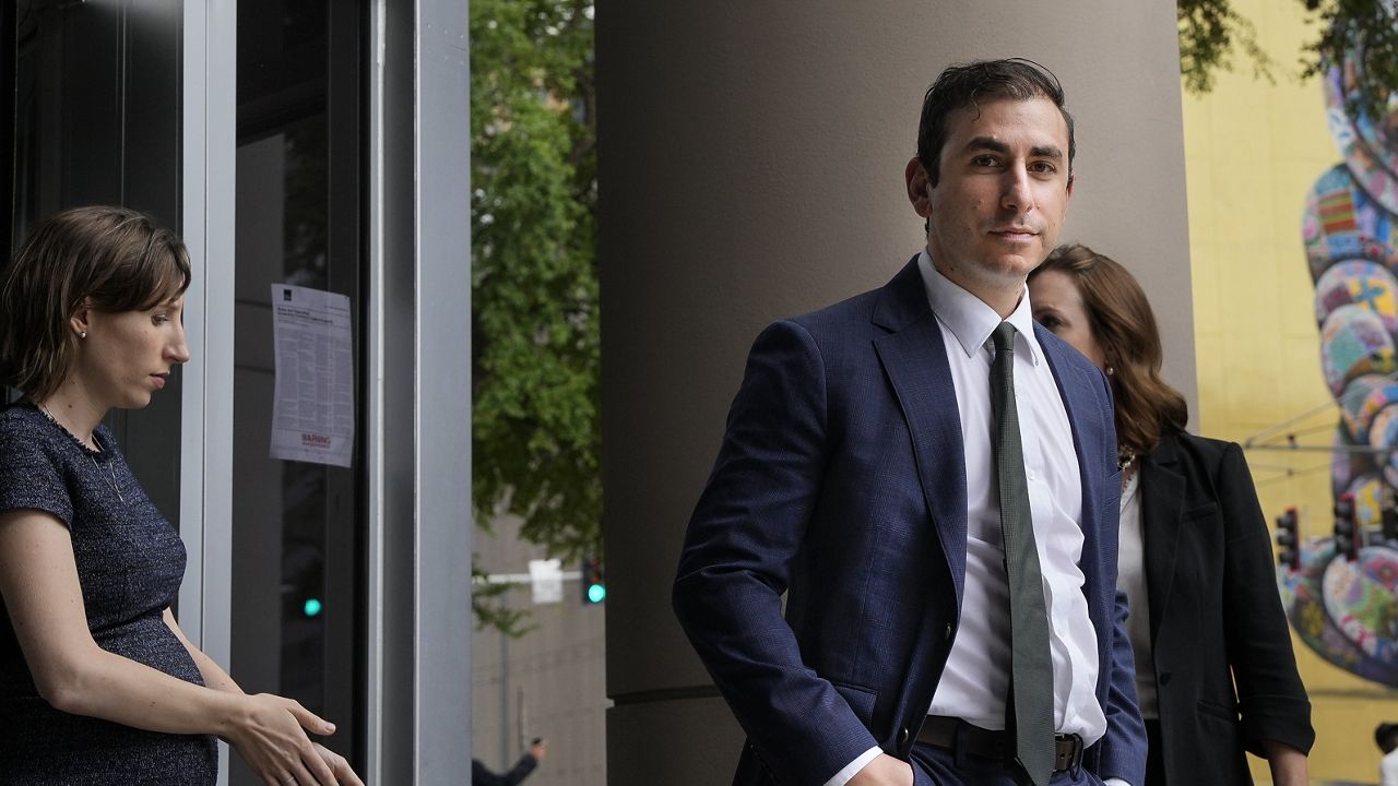 Dr. Eithan Haim walks out of the Bob Casey United States Courthouse after appearing for an arraignment hearing Monday, June 17, 2024 in Houston. (Yi-Chin Lee/Houston Chronicle via AP)