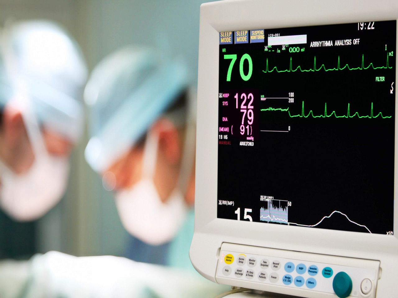 An EKG machine monitors heart rate and vitals during surgery. 