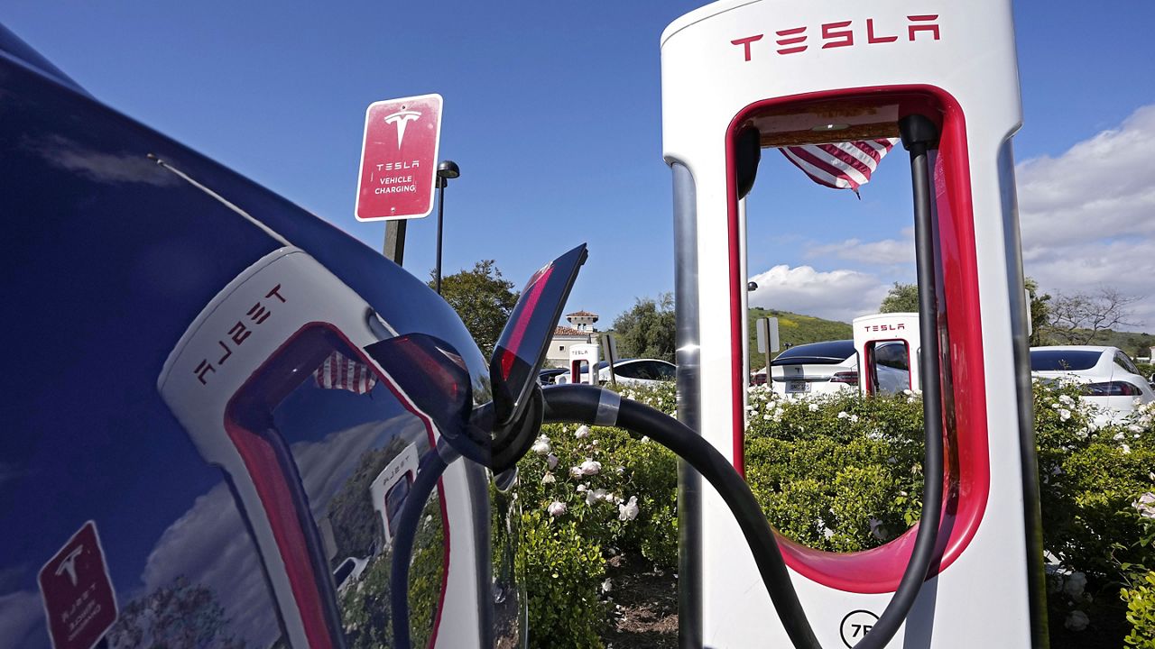 Tesla electric vehicles are seen at Tesla chargers, May 10, 2023, in Westlake, Calif. (AP Photo/Mark J. Terrill, File) 