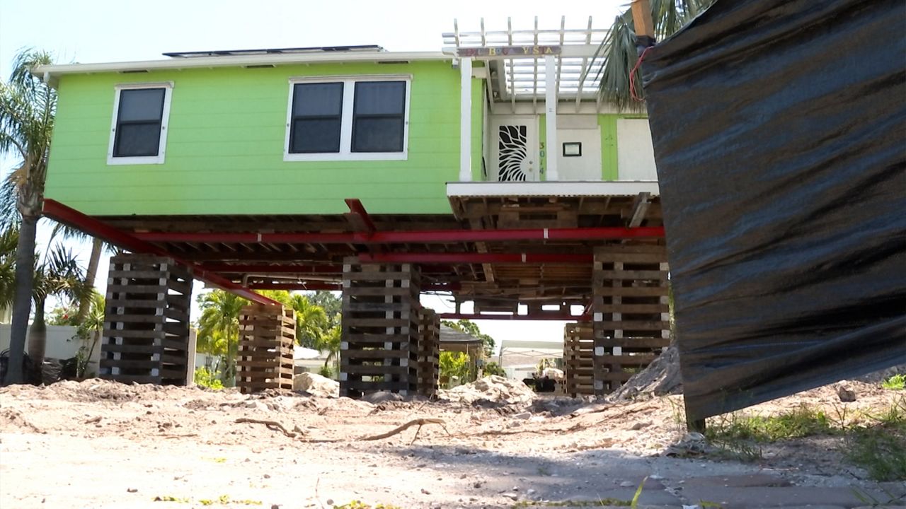 Barbara Banno's neighbor's home being elevated (Courtesy / Spectrum News)