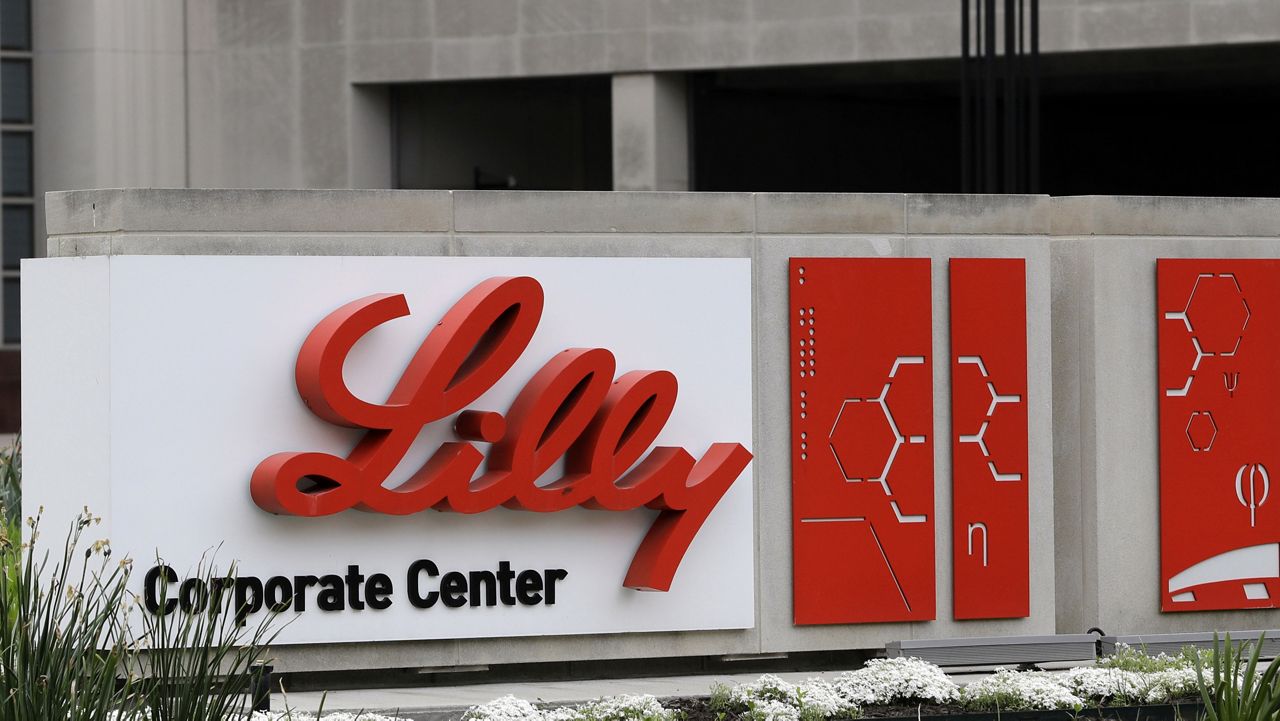 A sign for Eli Lilly & Co. stands outside their corporate headquarters in Indianapolis on April 26, 2017. (AP Photo/Darron Cummings)