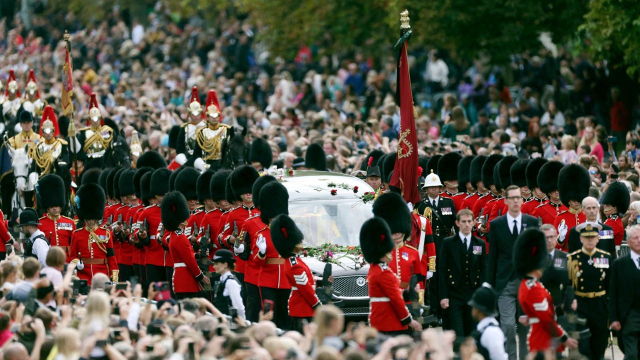 The coffin of Queen Elizabeth II is carried in a hearse along the Long Walk toward Windsor Castle. (Lee Smith/Pool Photo via AP)