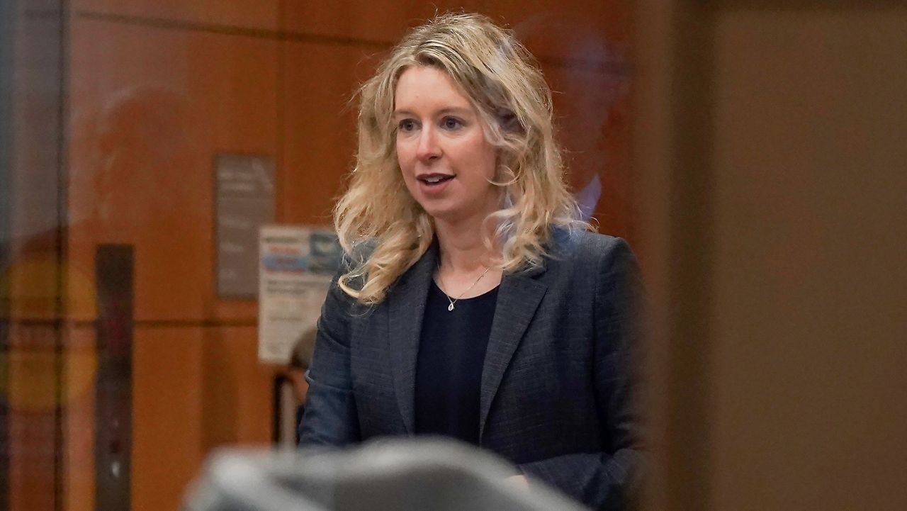 Former Theranos CEO Elizabeth Holmes arrives at federal court in San Jose, Calif., on Oct. 17, 2022. (AP Photo/Jeff Chiu, File)