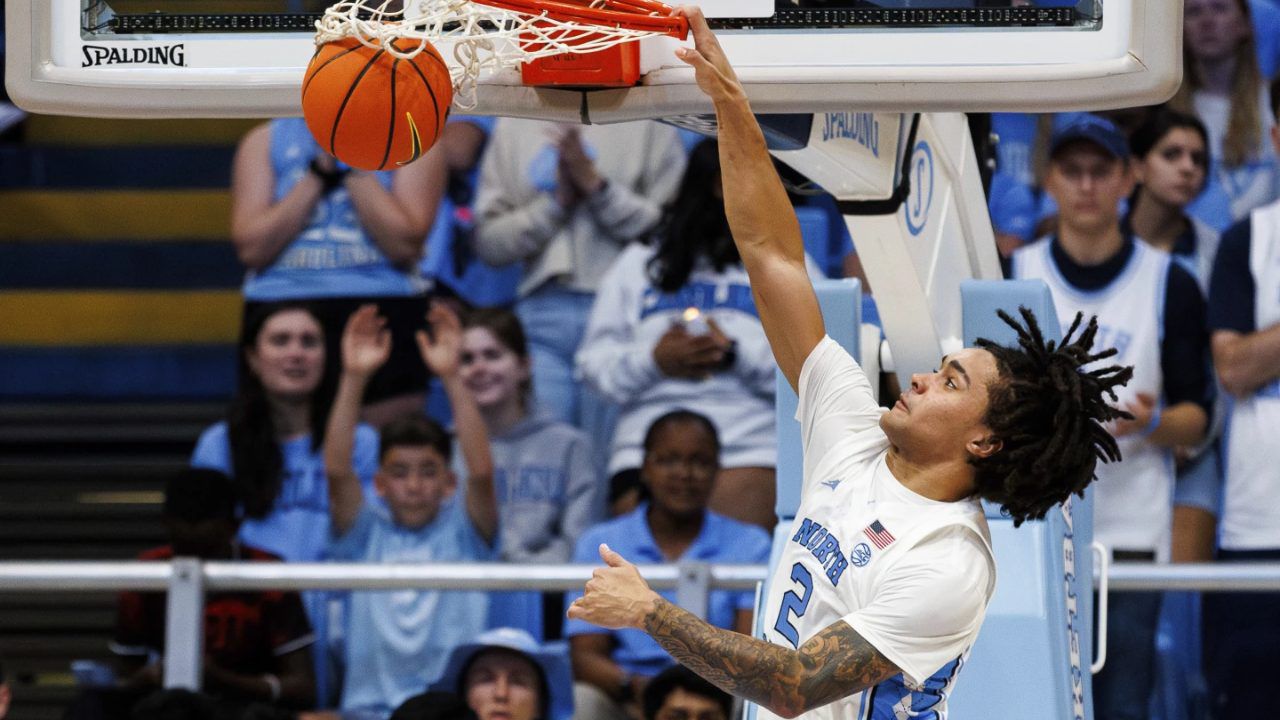 North Carolina's Elliot Cadeau dunks during the second half of an NCAA college basketball exhibition game against Saint Augustine's in Chapel Hill, N.C., Friday, Oct. 27, 2023. (AP Photo/Ben McKeown)