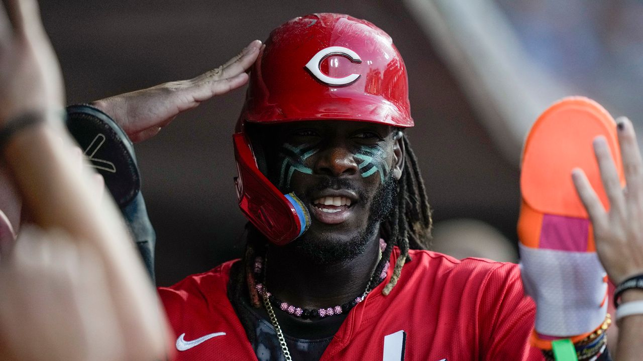 Cincinnati Reds' Elly De La Cruz celebrates in the dugout after scoring off a single hit by Tyler Stephenson during the third inning of a baseball game against the Houston Astros, Wednesday, Sept. 4, 2024, in Cincinnati. (AP Photo/Carolyn Kaster)