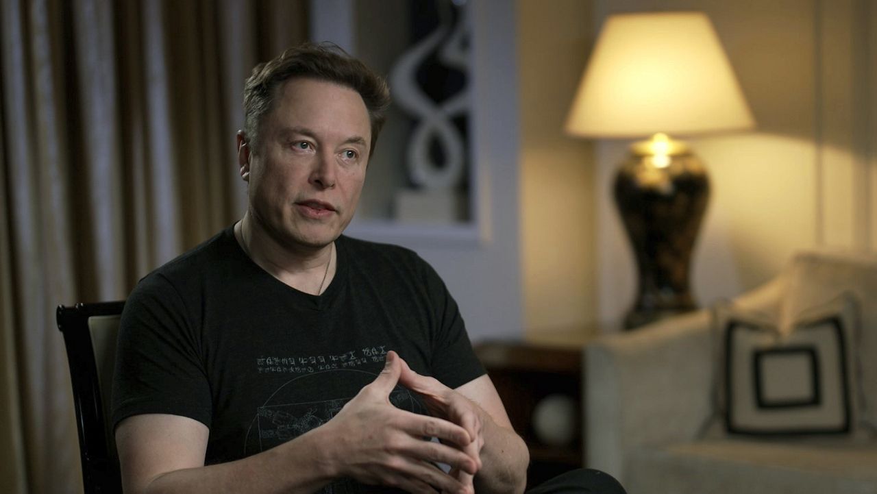 In this image released by Fox News, Elon Musk gestures as he is interviewed by host Tucker Carlson on April 13. (Fox News via AP)