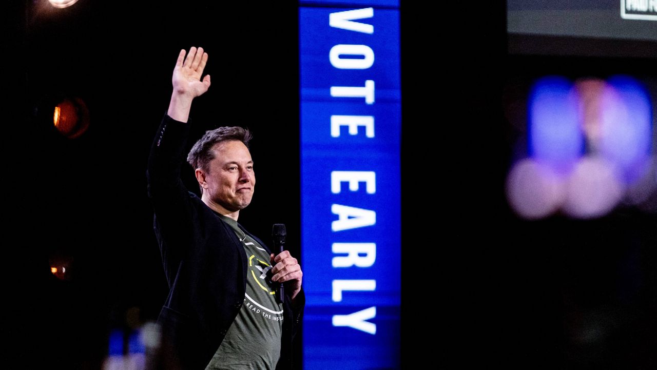 Elon Musk gestures as he speaks at Life Center Church in Harrisburg, Pa., Saturday, Oct. 19, 2024. (Sean Simmers/The Patriot-News via AP)