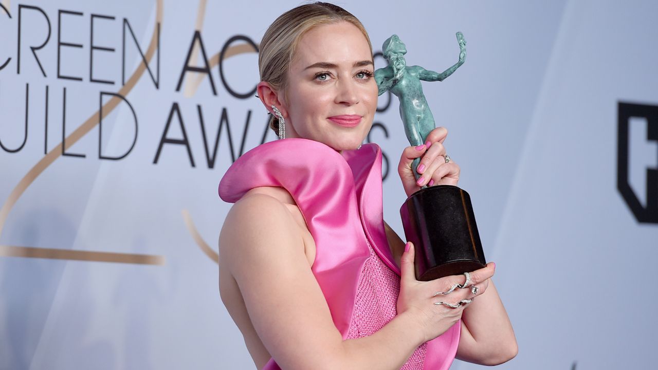 Emily Blunt poses with the award for outstanding performance by a female actor in a supporting role for "A Quiet Place" in the press room at the 25th annual Screen Actors Guild Awards at the Shrine Auditorium & Expo Hall on Sunday, Jan. 27, 2019, in Los Angeles. (Photo by Jordan Strauss/Invision/AP)