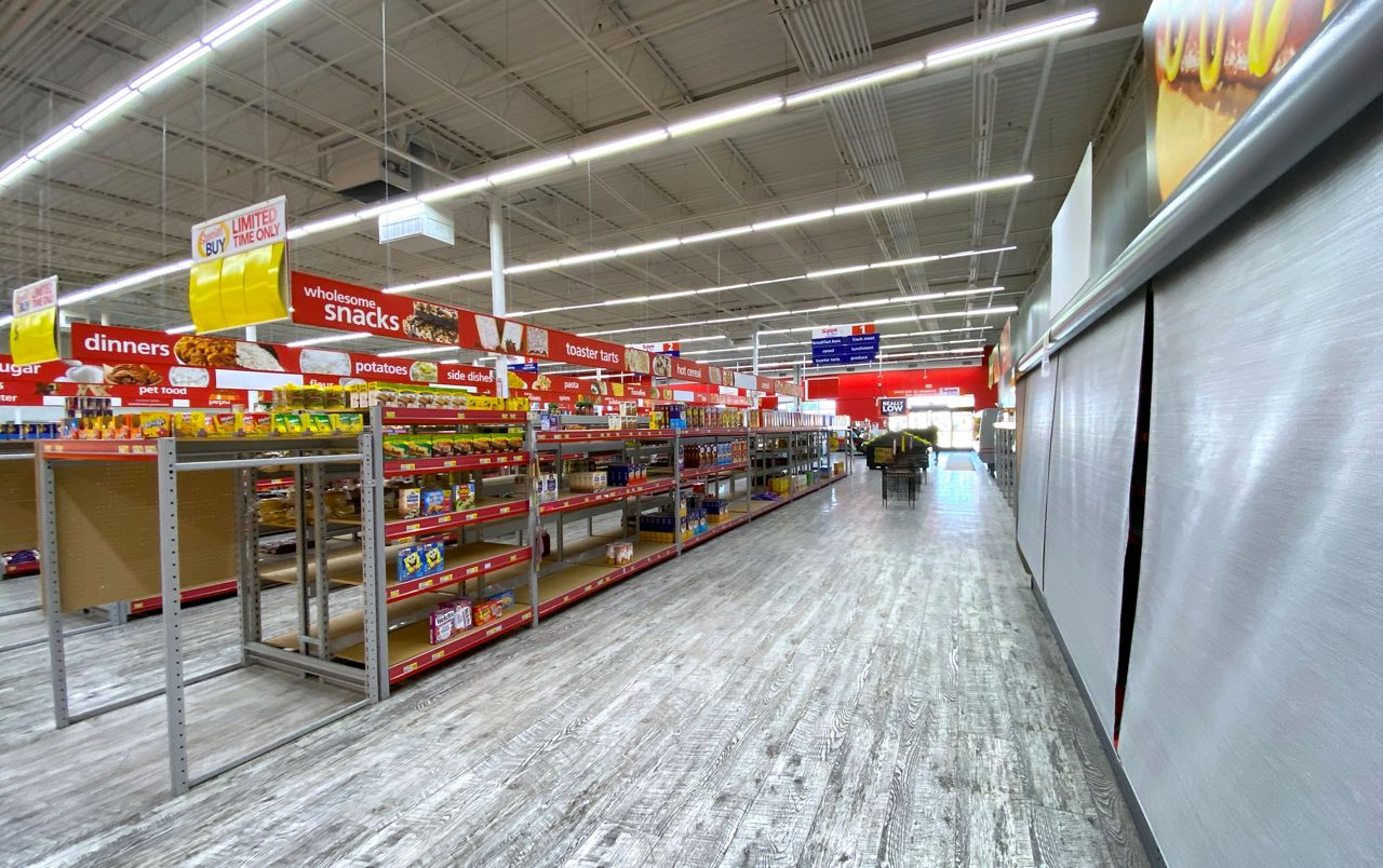 An empty deli case at the Save U More grocery store located in the Highland Hills neighborhood in South Dallas. (Stacy Rickard/Spectrum News 1)