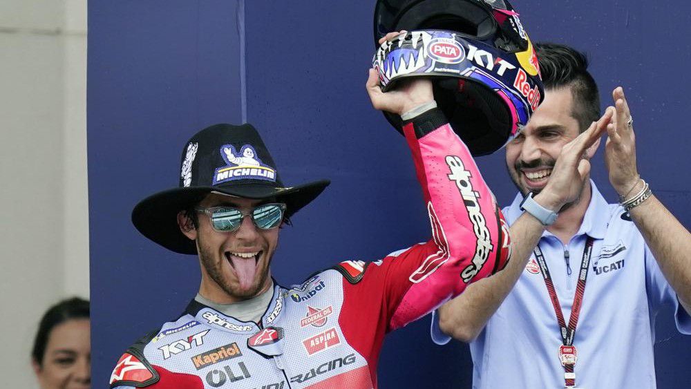 Enea Bastianini, left, of Italy, celebrates after winning the MotoGP Grand Prix of the Americas motorcycle race at the Circuit of the Americas, Sunday, April 10, 2022, in Austin, Texas. (AP Photo/Eric Gay)
