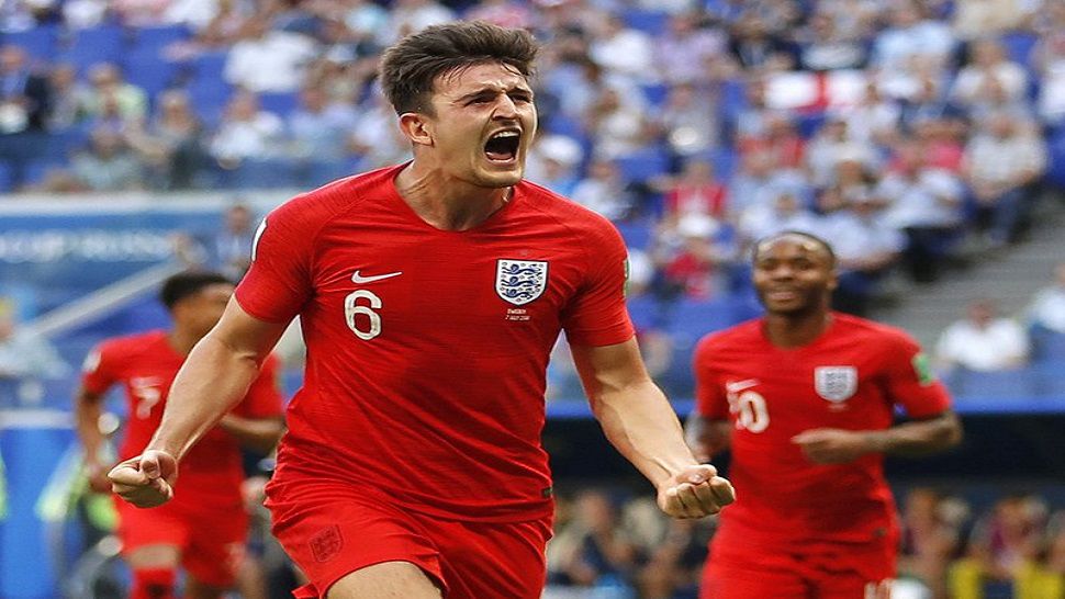 England’s Harry Maguire celebrates after scoring his side opening goal during the quarterfinal match between Sweden and England at the 2018 soccer World Cup in the Samara Arena, in Samara, Russia, Saturday, July 7, 2018. (AP Photo/Francisco Seco)