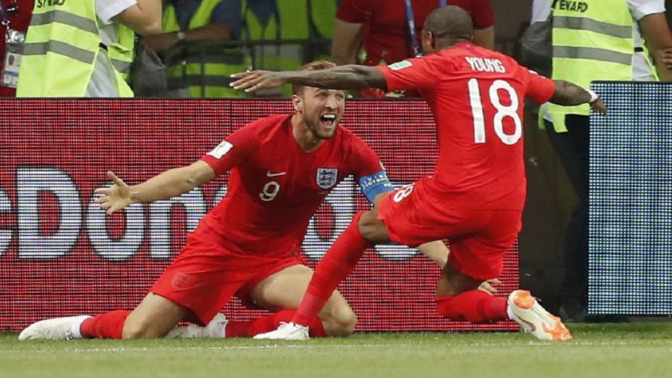 England’s Harry Kane, left, celebrates his winning goal with England’s Ashley Young during the group G match between Tunisia and England at the 2018 soccer World Cup in the Volgograd Arena in Volgograd, Russia, Monday, June 18, 2018. (AP Photo/Frank Augstein)