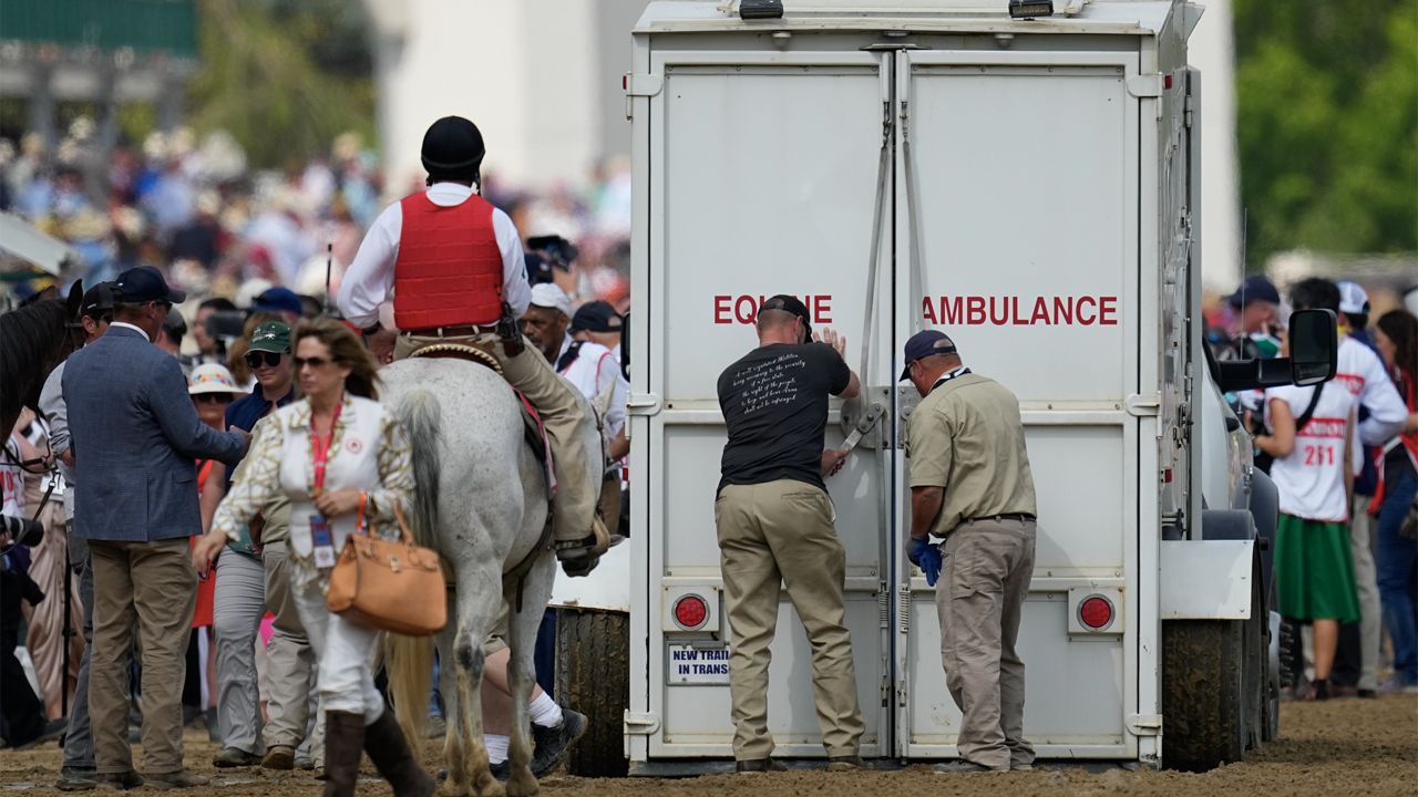 Here Mi Song is taken to the equine ambulance after the10th horse race at Churchill Downs Saturday, May 6, 2023, in Louisville, Ky. (AP Photo/Julio Cortez)