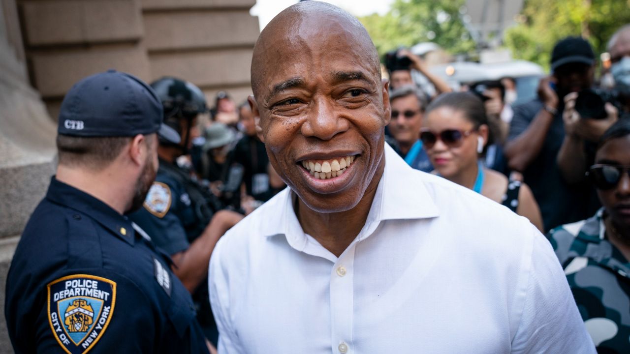 Eric Adams attended a march honoring the city's essential works in Manhattan a day after being declared the winner of the Democratic mayoral primary, July 7, 2021. (AP Photo/John Minchillo)
