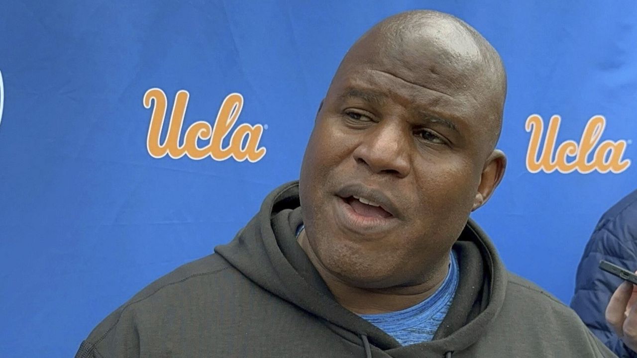  UCLA associate head coach and offensive coordinator Eric Bieniemy speaks with the reporters during an NCAA college football media availability, Thursday, April 4, 2024, in Los Angeles. (AP Photo/Joseph Reedy, File)