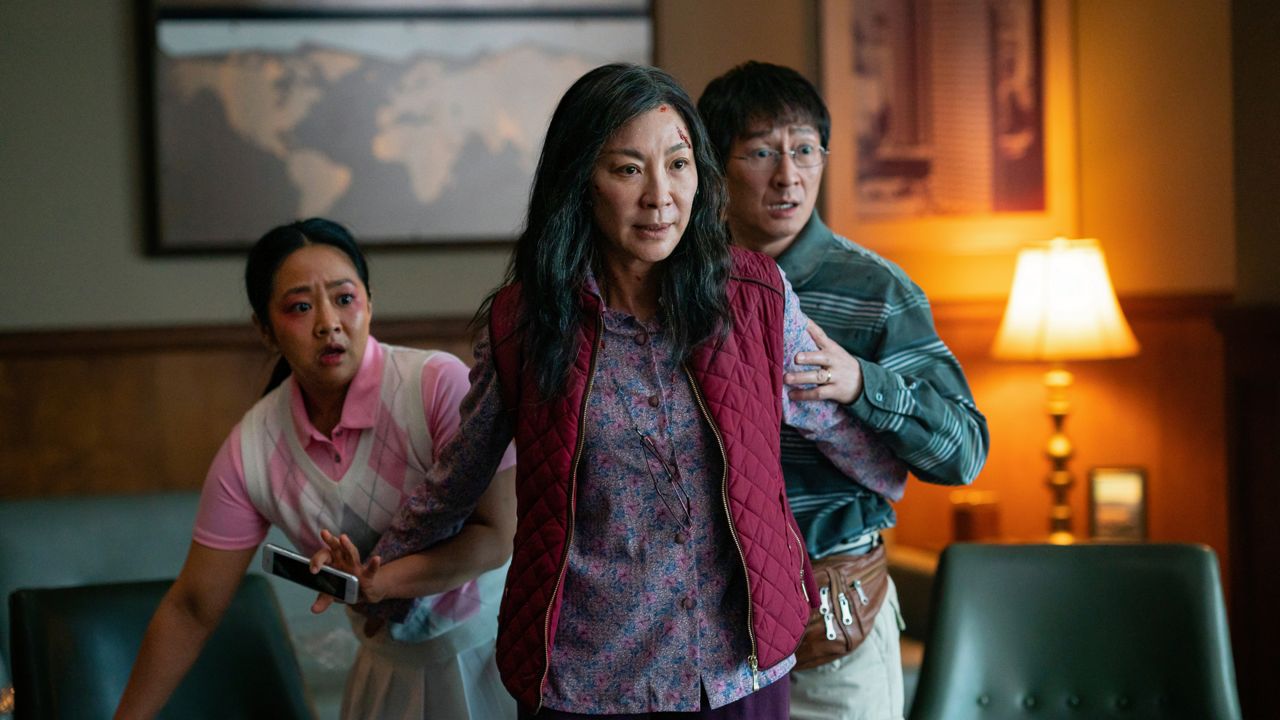 This image released by A24 Films shows, from left, Stephanie Hsu, Michelle Yeoh and Ke Huy Quan in a scene from, "Everything Everywhere All At Once." (Allyson Riggs/A24 Films via AP)