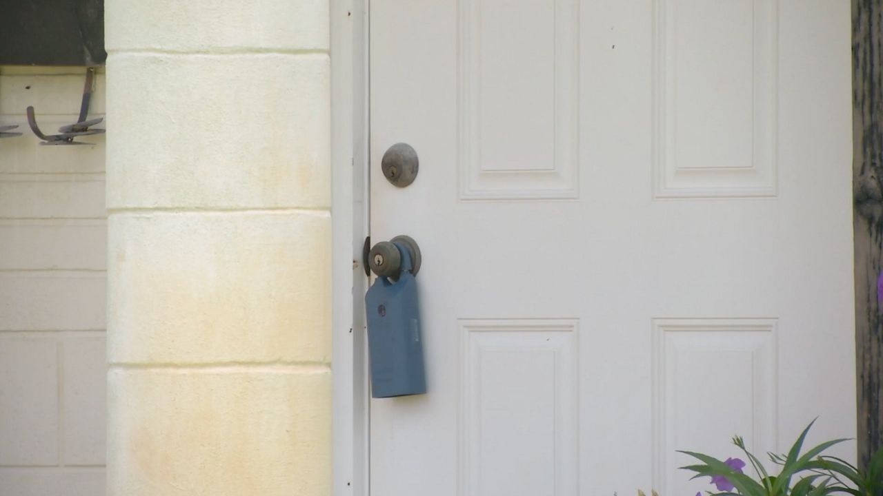 door with lockbox (spectrum news)