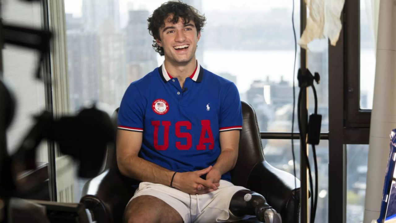 American Paralympic athlete Ezra Frech answers questions during an interview in April 2024. (Associated Press/Brittainy Newman)