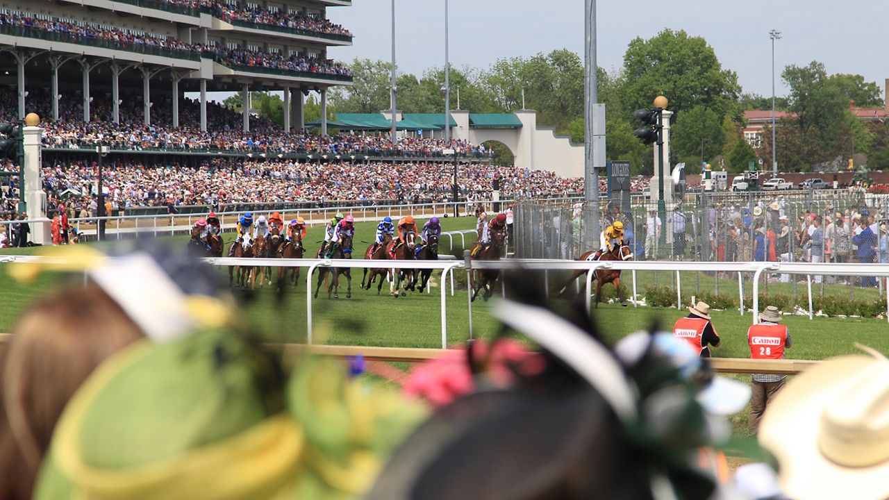 fans watching a race at churchill downs