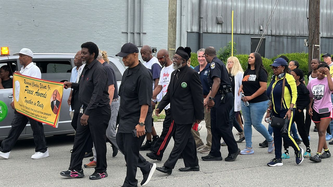 People gather and walk the streets of West Louisville for a future free from gun violence