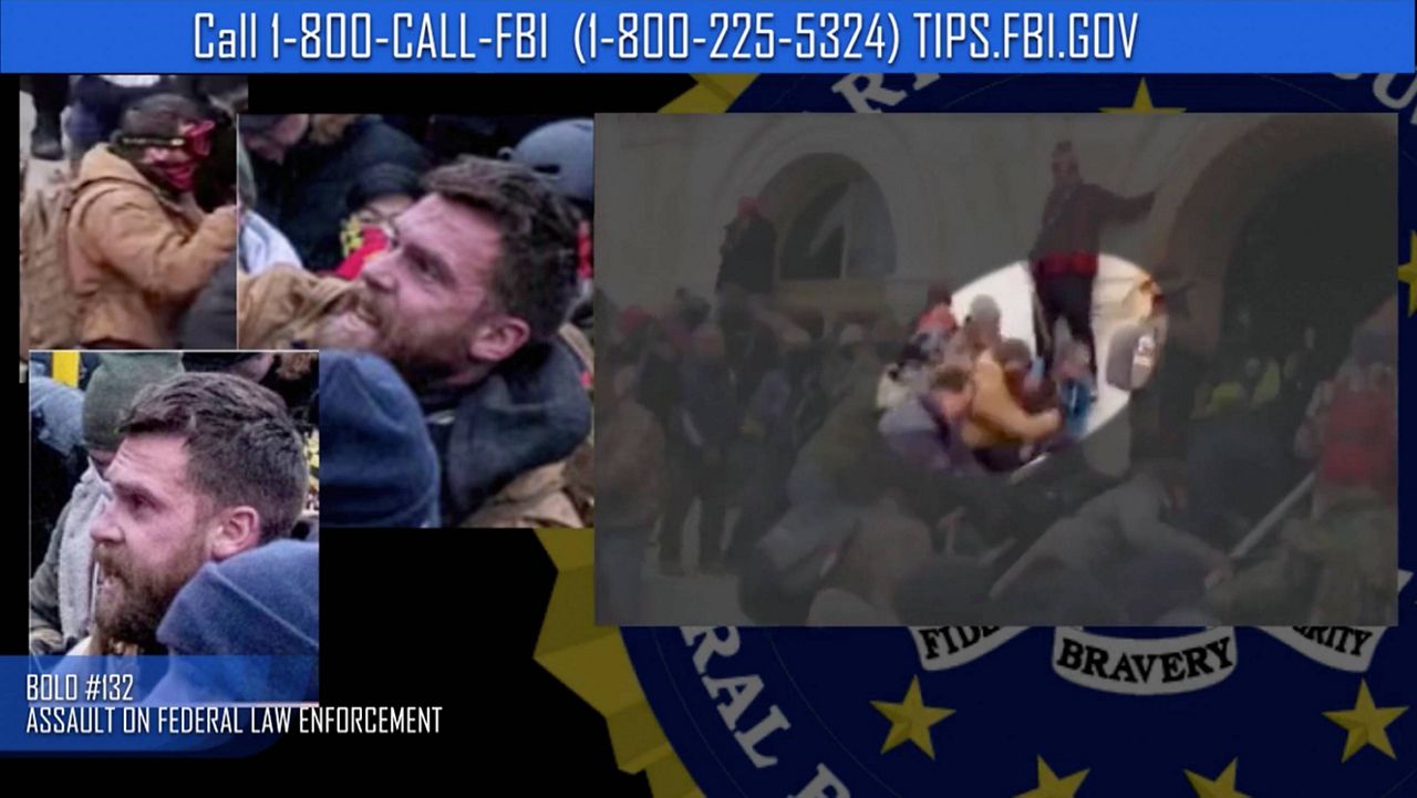 This image from FBI video is seeking information on a suspect in the violence at the U.S. Capitol on Jan. 6, 2021. (FBI via AP)