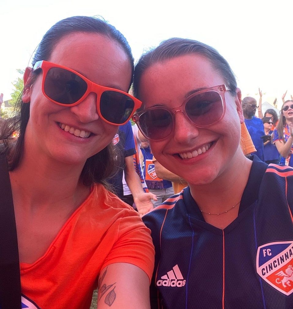 Sara Rozow (L) poses for a selfie with a friend in the stands at an FC Cincinnati match. (Photo courtesy of Sara Rozow)