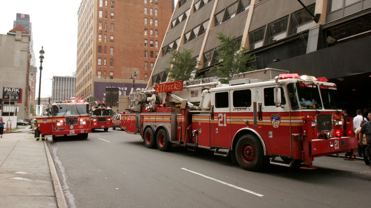 Fire trucks lined up outside the national headquarters of The Associated Press in New York City on Friday Sept. 1, 2006 after a small electrical fire forced the evacuation of the building. The one-alarm fire was on the 11th floor of the building in midtown Manhattan, according to a New York Fire Department spokesman, Pete Banks. The fire was not on a floor occupied by the AP.