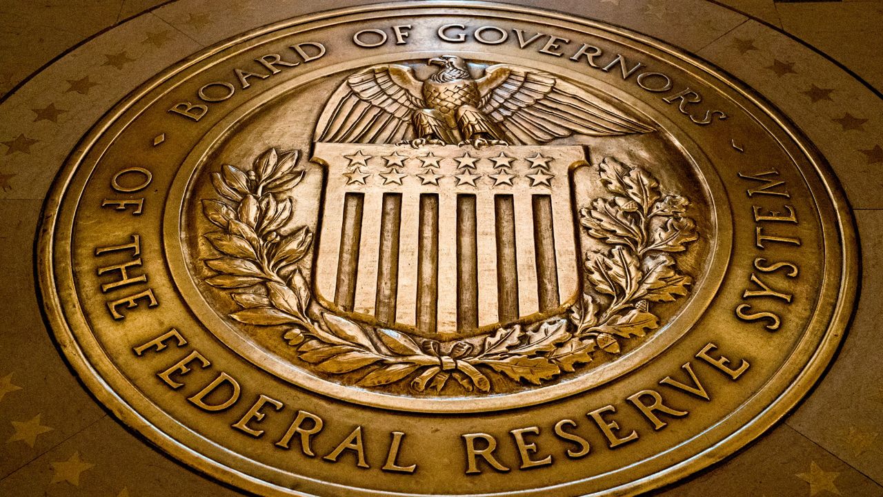 Fed raises key rate by half-point and signals more to come