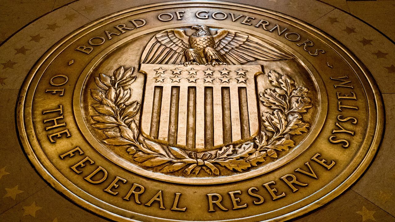 Fed raises key rate by half-point and signals more to come
