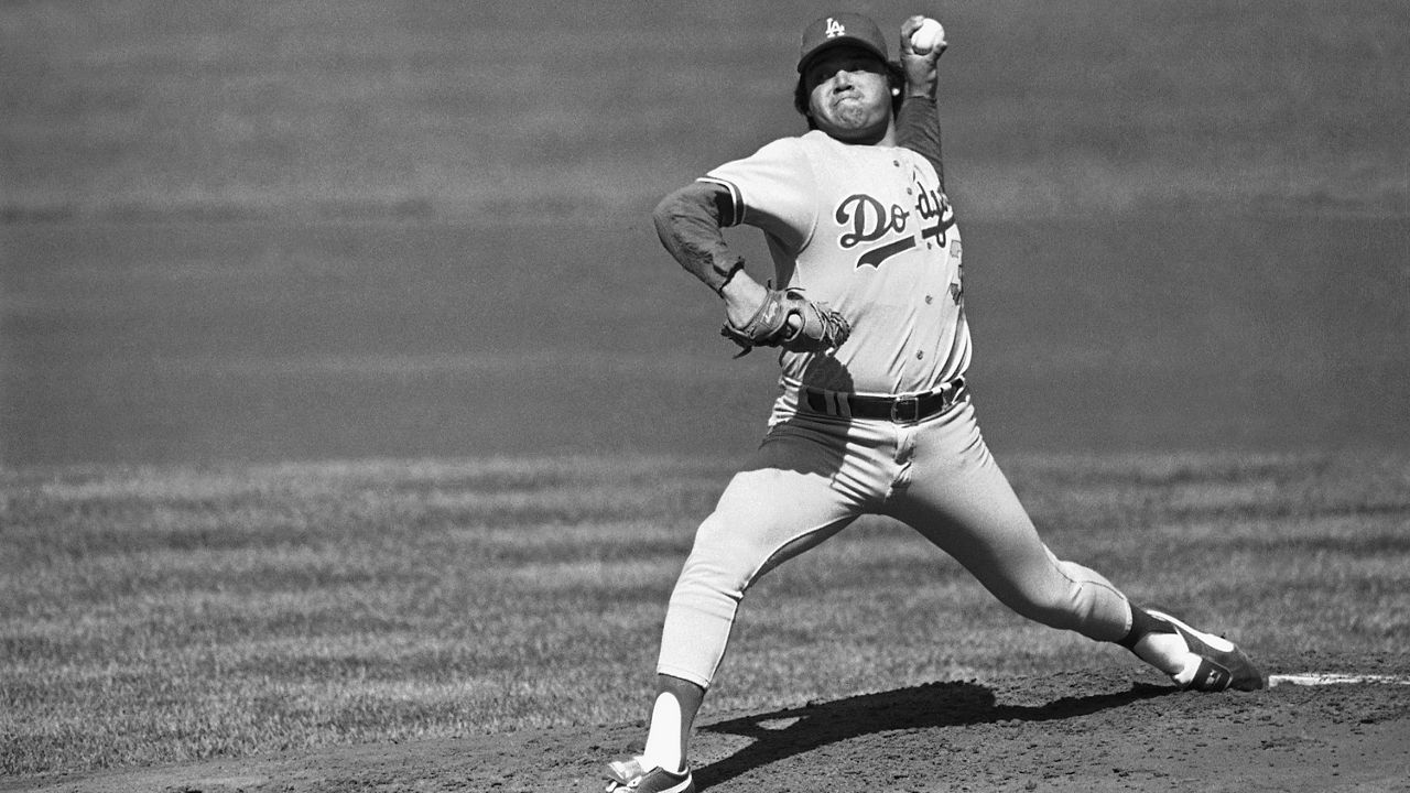 Los Angeles Dodgers pitcher Fernando Valenzuela pitches against a San Francisco Giants batter during the first inning at Candlestick Park, Oct. 3, 1982, in San Francisco. (AP Photo)