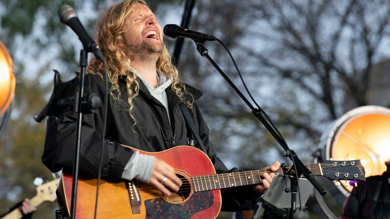 Christian musician Sean Feucht of California sings during a rally at the National Mall in Washington, Sunday, Oct. 25, 2020. (AP Photo/Jose Luis Magana)