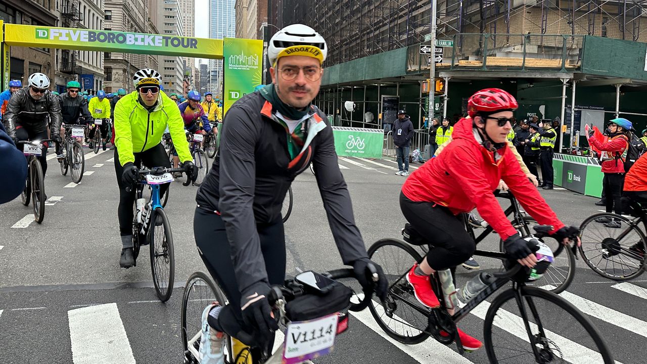 A cyclist is pictured riding in the Five Boro Bike Tour on Sunday.