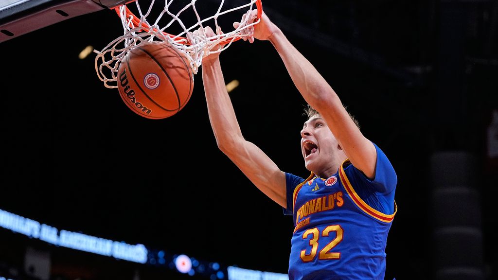 FILE - East forward Cooper Flagg dunks on a fast break during the third quarter of the McDonald's All American boys' basketball game Tuesday, April 2, 2024, in Houston. The incoming Duke freshman is among the potential headliners for the 2025 NBA draft.(AP Photo/Kevin M. Cox)